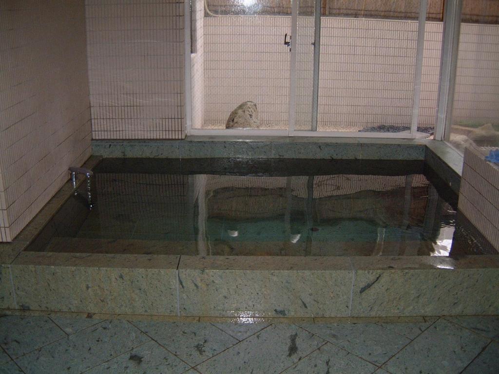 Sauna & Capsule Hotel Hokuo Tokyo Bagian luar foto